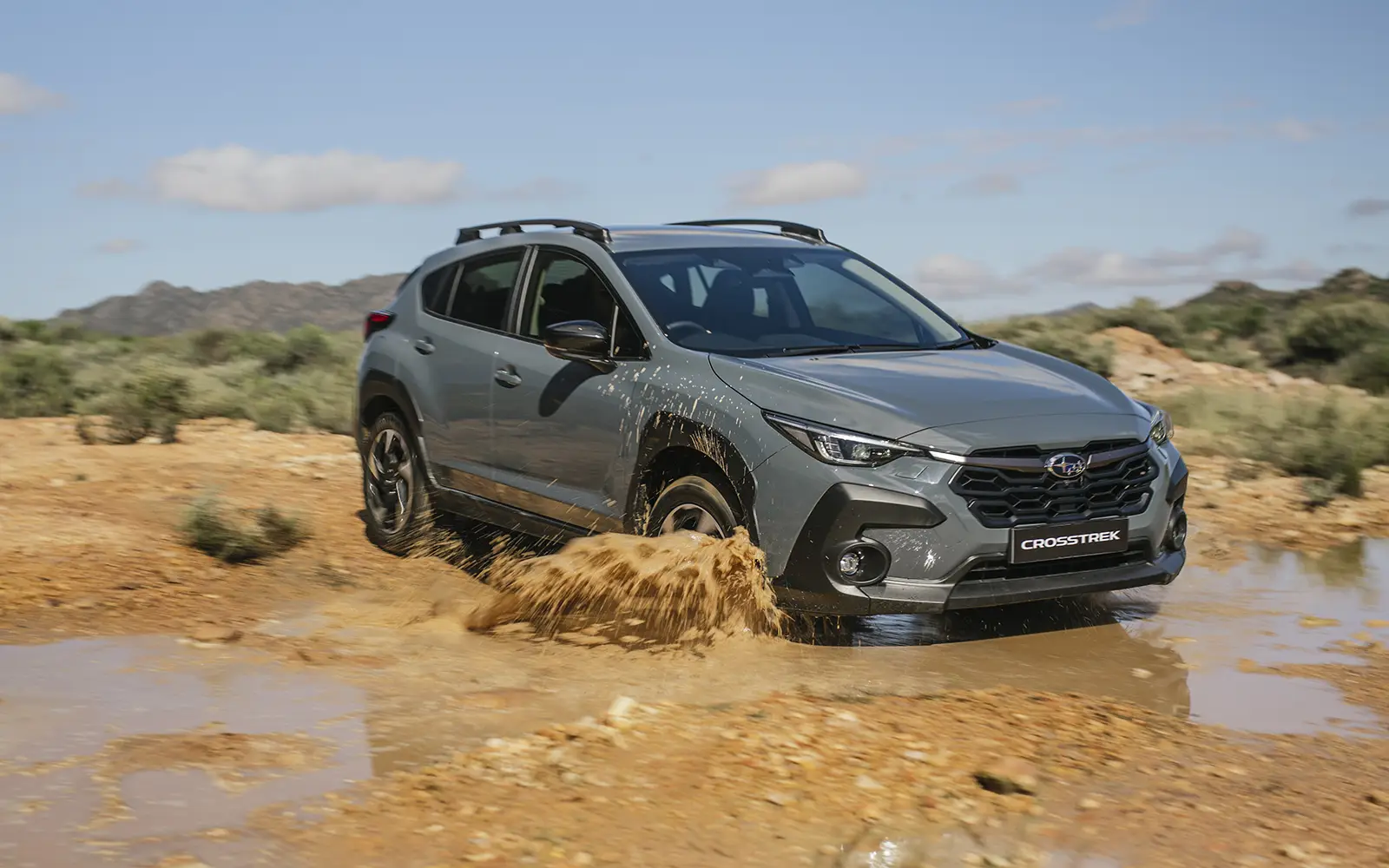 Subaru Crosstrek Symmetrical AWD và X-MODE 2 cấp độ hỗ trợ đi mưa
đường trơn và dã ngoại cuối tuần
